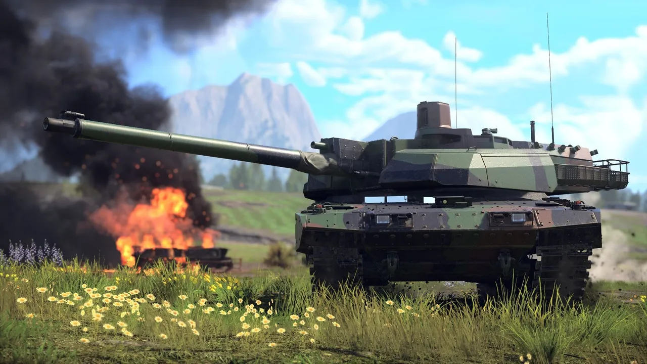 A camouflaged tank rolls past a burning wreck below a mountain on a sunny day in War Thunder